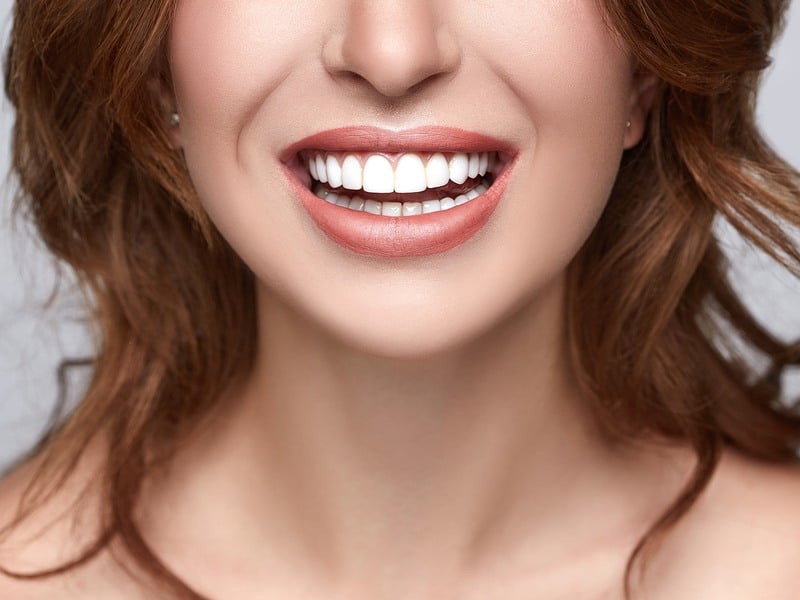 a close up of a woman