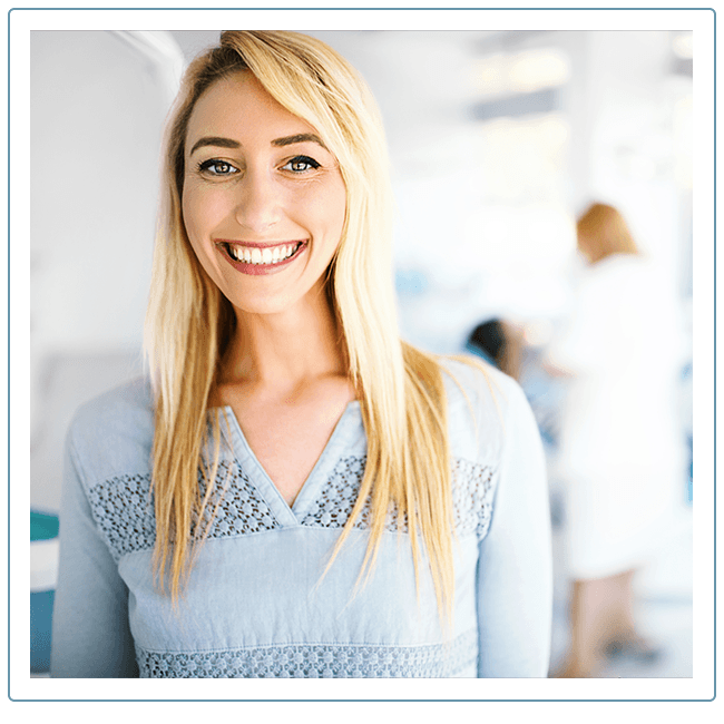 a woman smiling for the camera