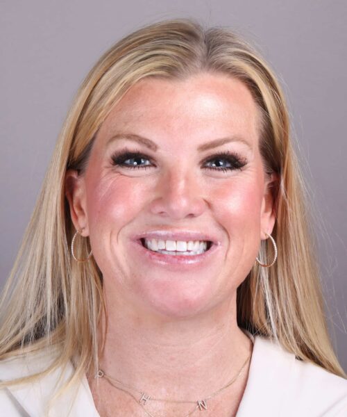 a woman smiling for the camera