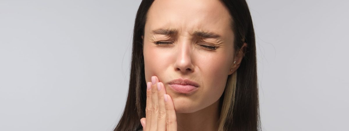 A woman wonders how long you can wait to get dental implants after she’s lost a tooth.