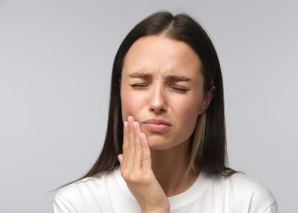 A woman wonders how long you can wait to get dental implants after she’s lost a tooth.